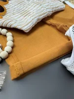 نمای نزدیک شلوارک کتان اسپری آجری