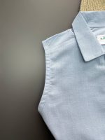 نمای نزدیک از آستین حلقه ای تاپ لِوار